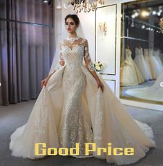 a woman in a wedding dress standing next to a mirror with the words good price on it