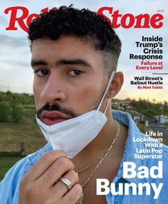 a man wearing a face mask on the cover of rolling stone magazine