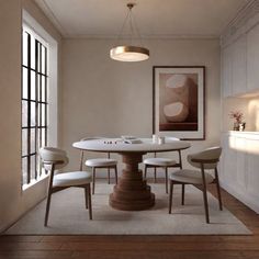 a dining room with a table and chairs next to an open window on the wall