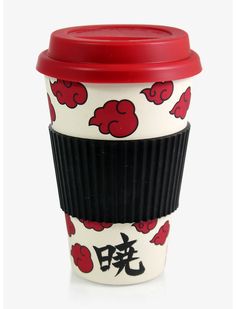 a coffee cup with red lid and black bottom