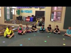 children sitting in a circle on the floor