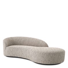 the curved sofa is made out of fabric