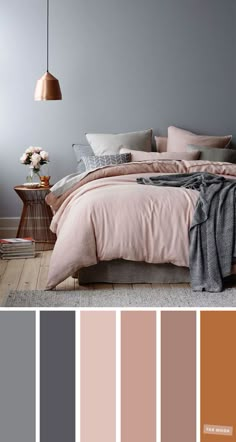 a bedroom with grey walls, pink bedding and neutrals in the color scheme