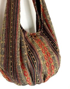 Cheap Traditional Handmade Shoulder Bag, Bohemian Canvas Bag With Adjustable Strap For Travel, Bohemian Canvas Travel Bag With Adjustable Strap, Bohemian Satchel Beach Bag With Removable Pouch, Bohemian Satchel Canvas Bag For Travel, Everyday Bohemian Handheld Bucket Bag, Bohemian Beach Bag Satchel With Removable Pouch, Bohemian Handheld Shoulder Bag For Everyday, Hippie Rectangular Shoulder Bag For Daily Use