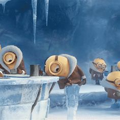 the minions from despicable me standing in front of an ice cave