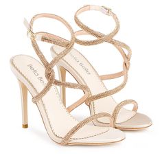 These strappy gold heels feature crystal ropes that wrap around the leg with an adjustable strap. Try not to blind anyone in these gold crystal heels. Bling Heels, Golden Crystal, Gold Strappy Heels, Ivory Wedding Shoes, Crystal Heels, Rope Wrapped, Bridal Heels, Embroidered Shoes, Wedding Heels