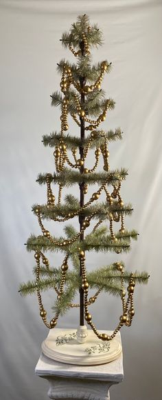 a small christmas tree with lights on it