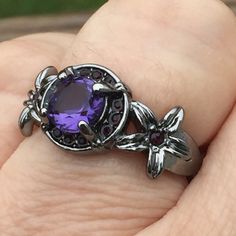 Gorgeous Lab Created Amethyst Halo Ring, Surrounded By Dark Purple Cz And Framed By Two Flowers. 18k Black Gold Filled Fashion Ring. Size 8. Brand New! Manufacturer Stated Black Gold Filled. No Stamp. Selling As Fashion Jewelry. Princess Diamond Ring, Two Flowers, Black Gold Ring, Floral Halo, Purple Rings, Cz Rings Engagement, Swirl Ring, Stylish Rings, Rings Engagement