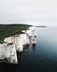 white cliffs on the edge of an ocean