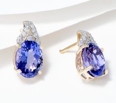 Such a striking beauty, this pair of 14K gold earrings features tanzanite gemstones topped with diamonds. From Affinity® Fine Jewelry.    Original item is J426032. This product may be a customer return, vendor sample, or on-air display and is not in its originally manufactured condition. It may not be new. In some instances, these items are repackaged by QVC. Tanzanite Diamond Earrings, Qvc Jewelry, Striking Beauty, Tanzanite Earrings, Tanzanite Diamond, Tanzanite Gemstone, Diamond Earring, Gold Earrings, Diamond Earrings