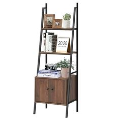 a book shelf with books, pictures and plants on it's top shelves in front of a white background