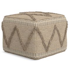 an ottoman that is made out of jute