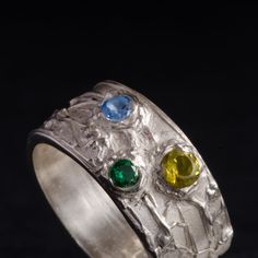 This "Waikiki" silver ring is handmade in Fine Silver (99.9% pure silver). This unique piece is entirely molded by hand, using the silver clay technique. It is finished with three colorful CZ Zirconias. The style of this ring is inspired by the luxurious beauty of the islands of Hawaii. CZ Zirconias: one topaz, one emerald and one peridot Zirconia Ring size: 8.5 (This is a unique creation. Only one size available. I cannot adjust the ring size.) What is Fine Silver? Fine Silver, also called Prec Luxury Handmade Unique Topaz Ring, Islands Of Hawaii, Silver Clay, Zirconia Rings, Fine Silver Jewelry, Precious Metal Clay, Jewelry Workshop, Jewelry Techniques, Metal Clay