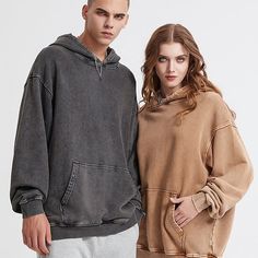 Taupe-colored hoodie with a vintage washed-out effect. Features an oversized, relaxed fit with dropped shoulders for a comfortable, slouchy look. The hoodie has a large kangaroo pocket and a drawstring hood. Distinctive contrast stitching in a lighter shade accentuates the seams, adding visual interest. The worn-in appearance gives this piece a casual, lived-in vibe perfect for laid-back streetwear styles. Mens Tights, Shirts Women Fashion, Style Streetwear, Blue Khakis, Crop Top Shirts, Taupe Color, Green And Khaki, Black Khakis, Outerwear Coats