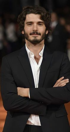 Yon Gonzalez, Greek Hair, Mens Haircuts Medium, Hispanic Men, Blue Jacket Men, Mens Hairstyles Thick Hair, Wavy Hair Men, Standing Poses, Boy Photography Poses