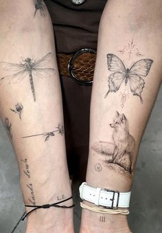 two people with tattoos on their arms and one has a bear, dragon, and butterfly tattoo