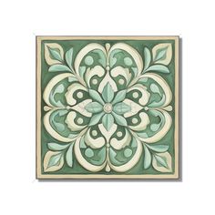 a green and white tile with an ornate design on the bottom, surrounded by leaves