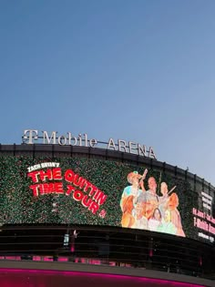 a large sign on the side of a building that says, t - mobile arena