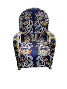 a blue chair with colorful designs on it