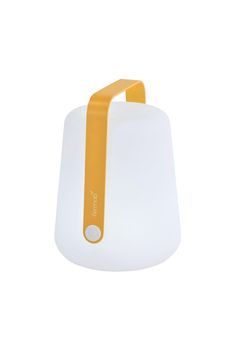 an orange and white light with a yellow handle on the side, against a white background