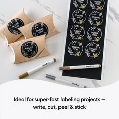 some stickers are on top of a table next to pens and paper with the words idea for super - fast labeling projects write, cut, peel & stick