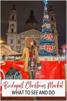 a woman standing in front of a christmas tree with the words budapest christmas market what to see and do