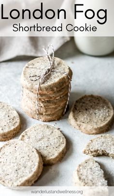 the london fog shortbread cookies are stacked on top of each other and tied with twine