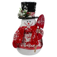 a snowman ornament with a red scarf and hat