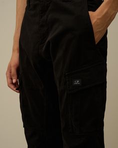 Cargo pants crafted in stretch sateen, a smooth and soft-textured stretch cotton. Garment dyed anti-drop treated. Man Trousers, Country Shop, C P Company, The C, Waist Bag, Black Stretch, Stretch Cotton, Cargo Pants, Casual Pants