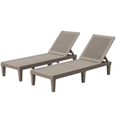 two lounge chairs sitting next to each other