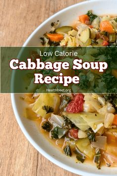 a white bowl filled with cabbage soup on top of a wooden table