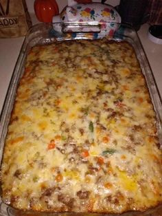 a casserole dish with meat and vegetables in it