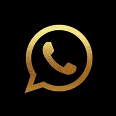 a gold phone icon with the letter q in it's center, on a black background