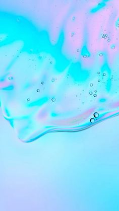 an abstract blue and pink liquid background