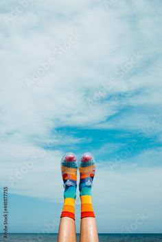 Stock Image: rainbow patterned socks and sandals upside-down Bounce House Socks, Spring 2025, Rubber Sandals, Patterned Socks, Socks And Sandals, Rainbow Pattern, Upside Down, The Ocean, The Beach