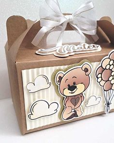 a brown box with a white bow on it