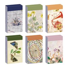 four books with different designs on them, each containing an image of a trumpet and flowers