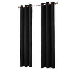 two black curtains hanging on a metal rod