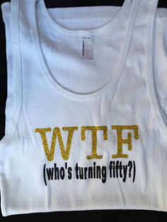 a white t - shirt with the words wife who's turning fifty? on it