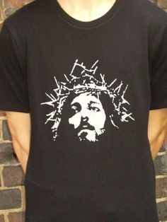 Jesus Christ T Shirt Print  Christian, God, Messiah, Jehovah Grey print of Jesus Christ Face. Printed on a Gildan 100% soft black cotton T shirt If you want a Heavier Gildan  T shirt just let us know, they are the same price Our womens sizes tend to be on the small side and are fitted Size S Size 6, M Size 6-8, L size 10, XL 12-14, XXL 14-16 The print shown is on a Medium mens t shirt Product Specifications                             S           M         L      XL   2XL BODY LENGTH 25.25  26.25  27.25  28  28.5 BODY WIDTH 16 17       18.5      19.5   22  23.5 Jesus Christ Face, Jesus Tshirts, Jesus Christus, Tee Shirt Homme, Grey Prints, Jesus Shirts, Christian Shirts, T Shirt Print, Soft Black