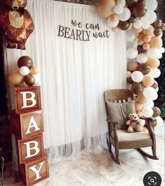 a baby shower is decorated with balloons and teddy bear blocks for the entrance to the room