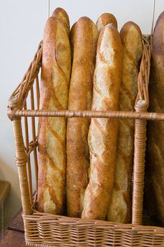 several loaves of bread in a wicker basket