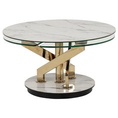 a white marble and gold metal coffee table with an x design on the top,