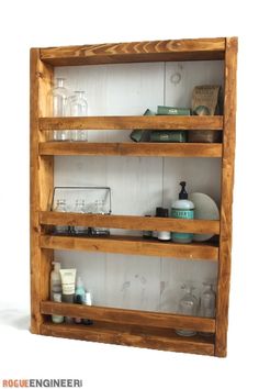 a wooden shelf with jars and bottles on it's shelves, which are labeled instagram