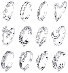 PRICES MAY VARY. Open Toe Rings Set for Women: You will get 12pcs different style toe rings in one order. Arrow toe ring, flower toe ring, wave ring, simple band ring, star moon ring,feather toe ring and leaf toe ring included. Unique design, never go out of style, perfect to wear it on the beach, party and wear as daily Jewelry.High polished finished,smooth inner surface,which won't hurt your toes or finger,comfortable wearing feeling.Various Vintage Styles Meet your different needs everyday We Cute Arrow, Arrow Ring, Beach Anklets, Style Hip Hop, Knuckle Rings, Foot Jewelry, Finger Rings, Heart With Arrow, Toe Rings