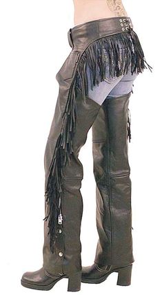 Rear fringe western chaps with 6" leather fringe that goes up one leg, around the back and down the other. These western leather chaps are made of1.2-3 mm thick top grade, premium buffalo leather. A quality women's leather chap that comes with a wind flap zipper cover, adjustable rawhide back lacing, front adjustable buckle, snap cuff so you can easily trim to length, a soft nylon lining and braid trim as available. Sizes: XS, S, M, L, XL, 2X, 3X, 4X, 5X. +$10 for 2X-3X, +$20 for 4X-5X. [5#] sma Fringe Chaps, Cowgirl Chaps, Showmanship Outfit, Biker Clothes, Cowboy Chaps, Harley Gear, Western Chaps, Motorcycle Wear, Leather Chaps