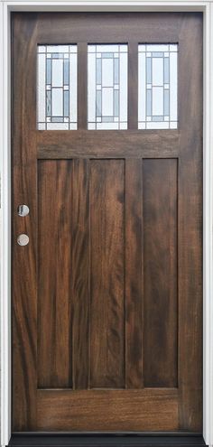 a wooden door with three glass panels