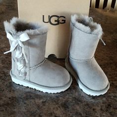 Cute Boots For Winter, Ugg Waterproof Boots, Toddler Ugg Boots, Cute Uggs, Uggs With Bows, Pretty Sneakers, Ugg Boot, Ribbon Laces, Pretty Shoes Sneakers