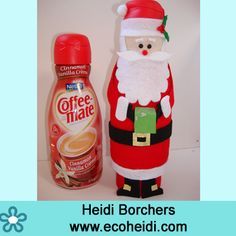 an image of a santa clause next to a bottle of coffee matee and a cup holder