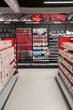 an aisle in a store filled with lots of items